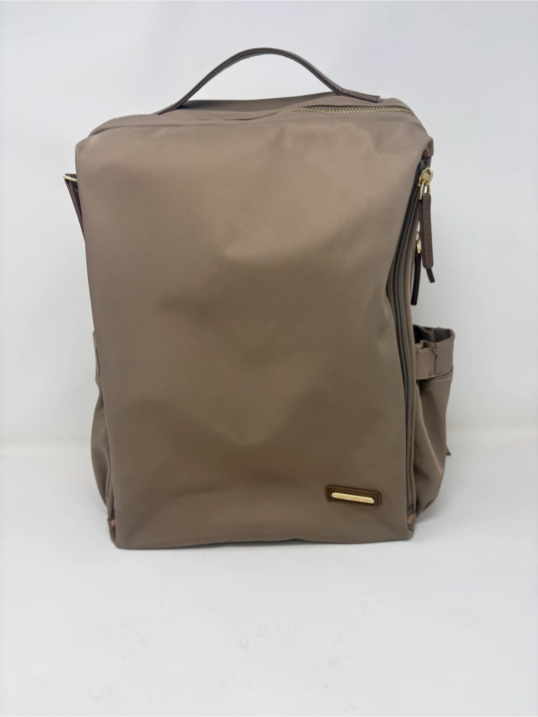 Cole Surpass beige backpack