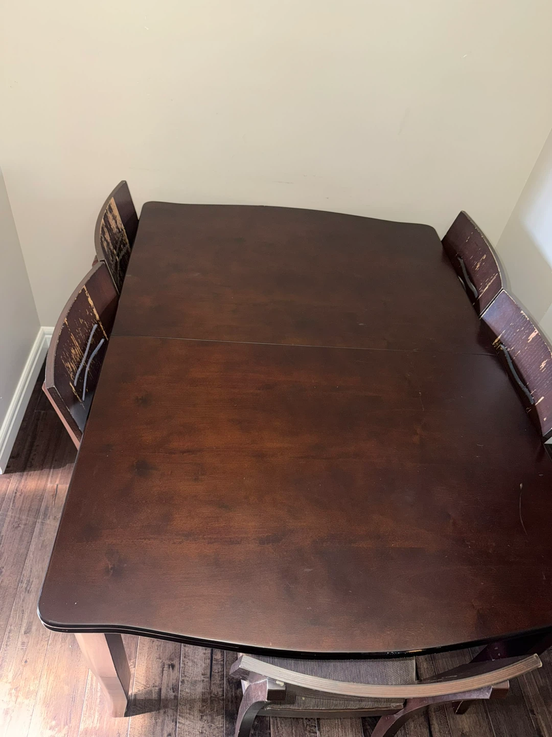 Dark wood dining table with 6 chairs