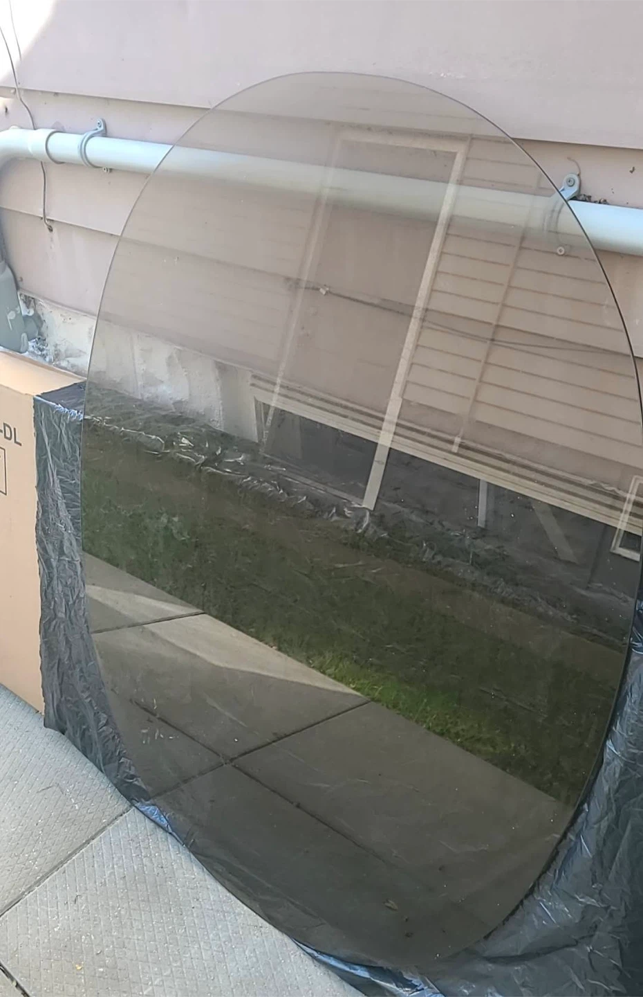 Oval tinted glass table top