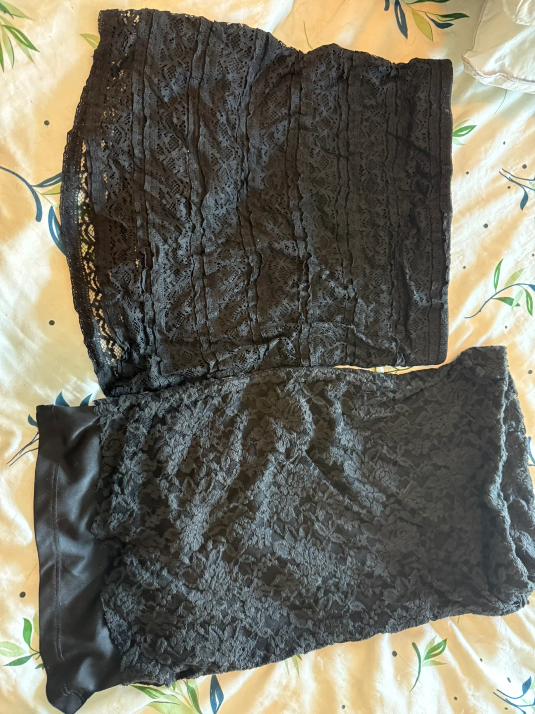 Two black lace skirts