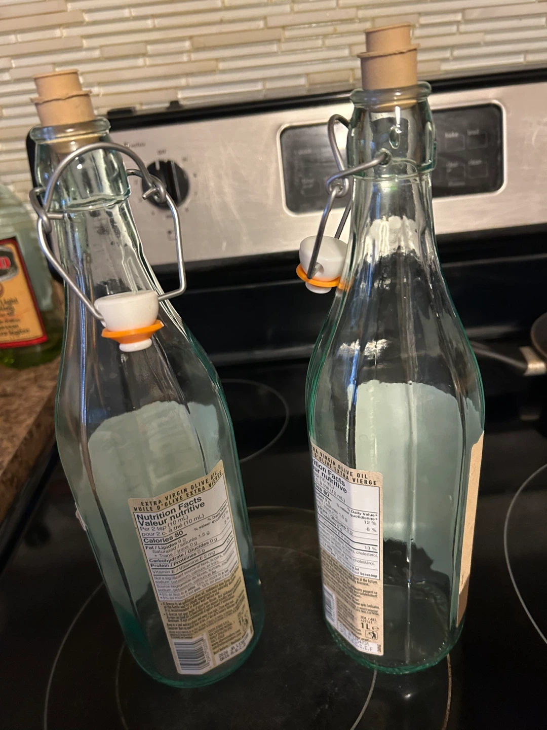 Two empty 1L glass swing-top bottles - photo 2