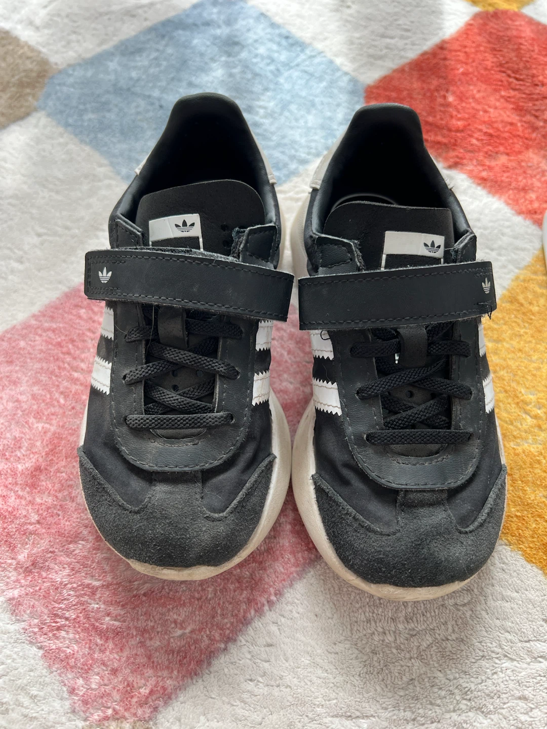 Two pairs of kids Adidas sneakers size 12.