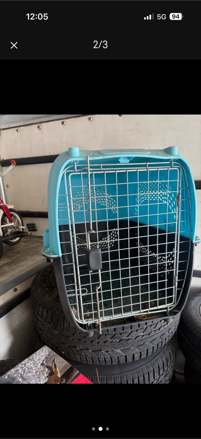 Blue and black pet travel carrier