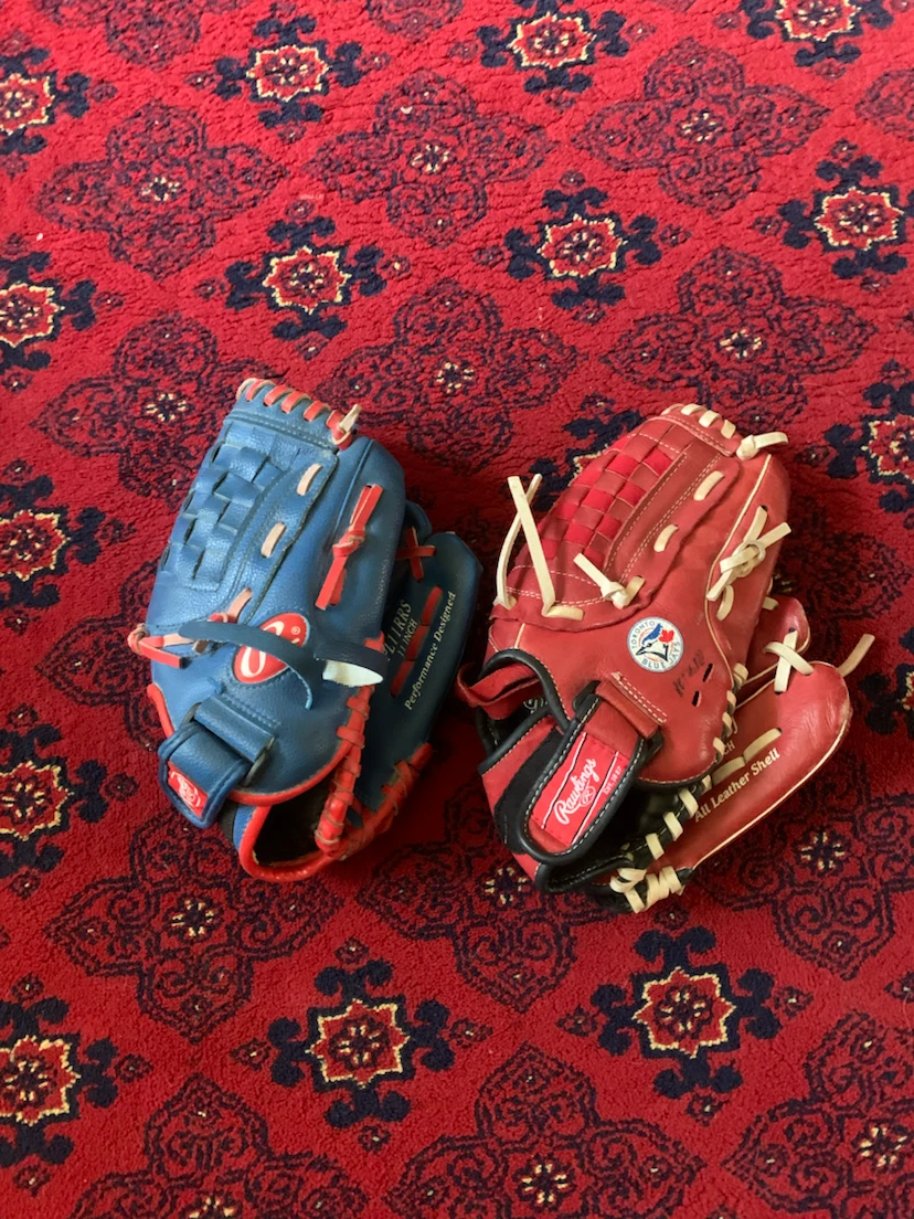Two Rawlings Baseball Gloves