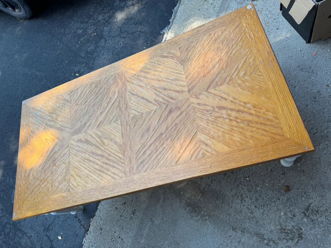 Wooden coffee table with white legs