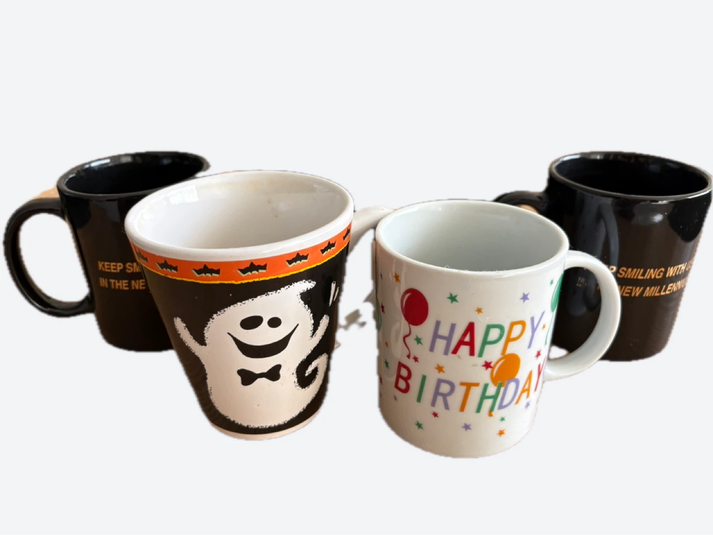 4 Assorted Ceramic Mugs