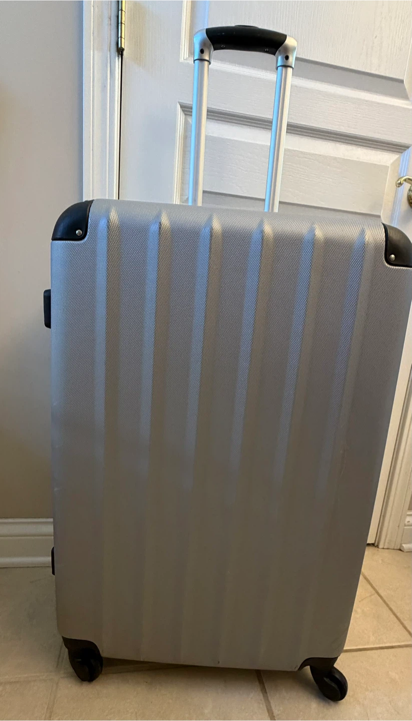 Large Silver Hardside Spinner Luggage
