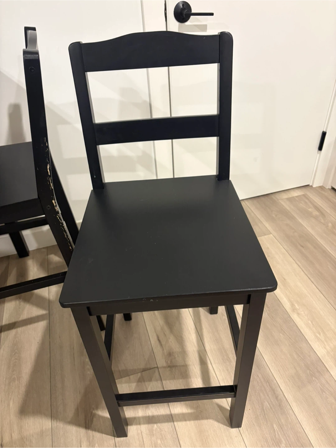 Black Ikea bar height table with 4 chairs. - photo 2