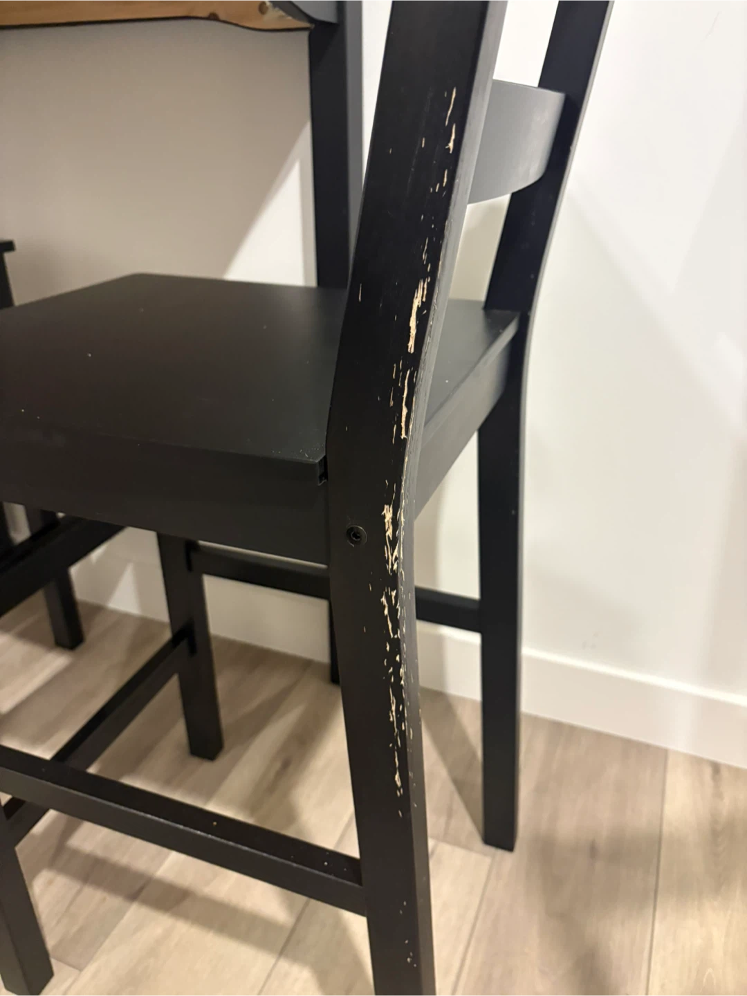 Black Ikea bar height table with 4 chairs. - photo 3