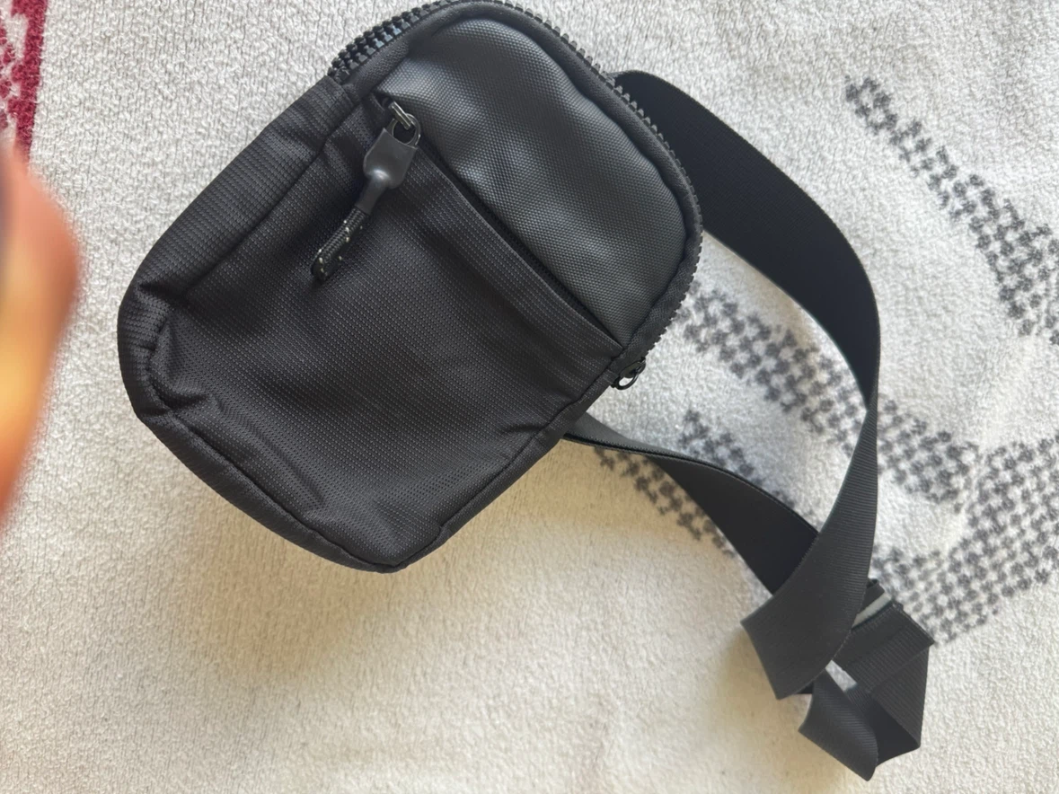 Black crossbody pouch bag
