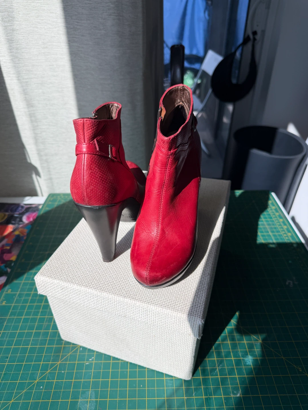 Red leather ankle boots