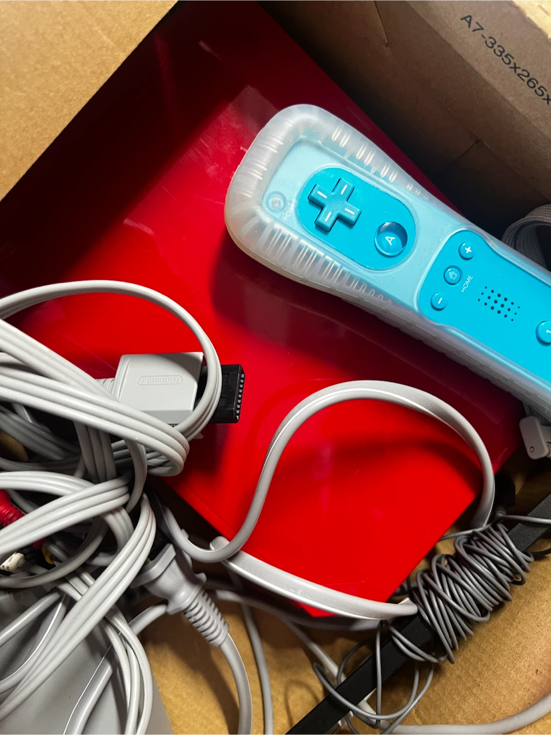 Red Nintendo Wii Console with Controller and Game