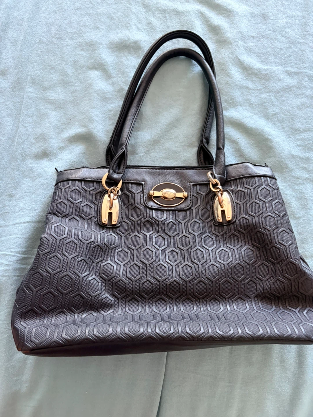 Black patterned tote handbag