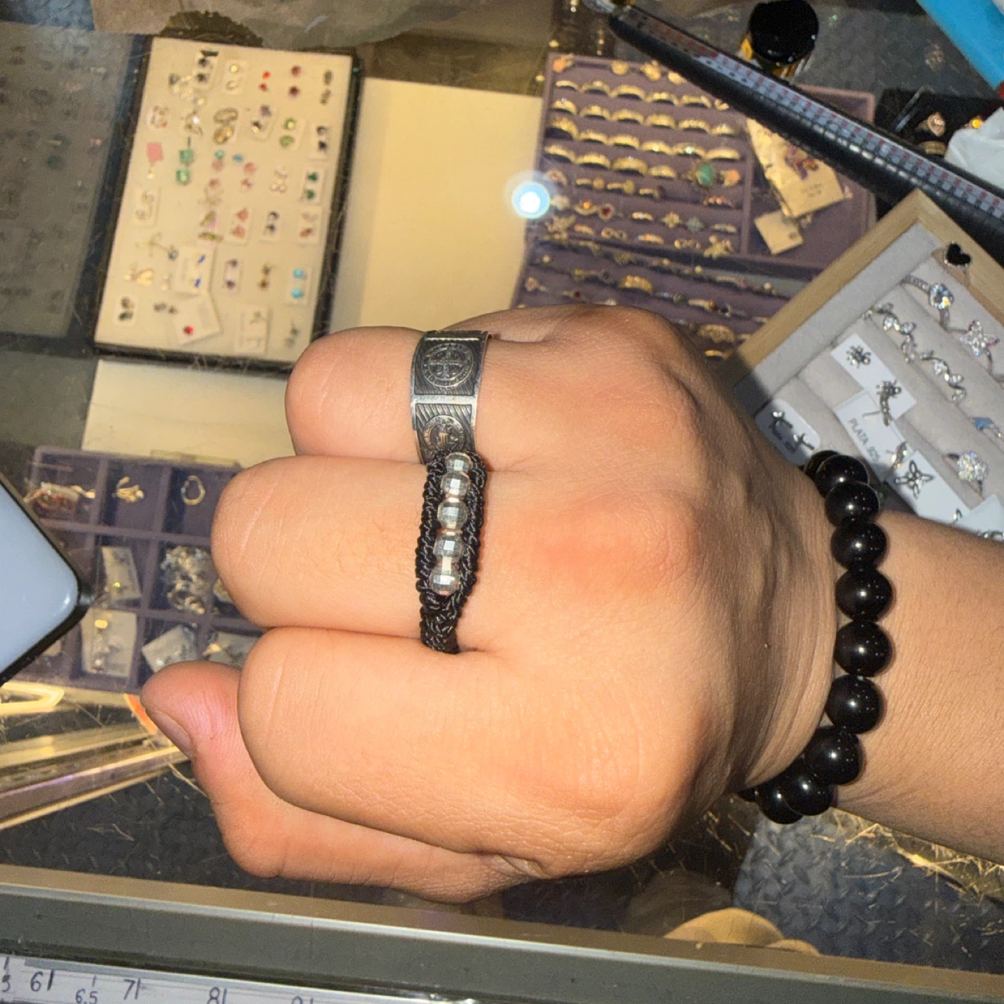 Woven black ring with silver beads