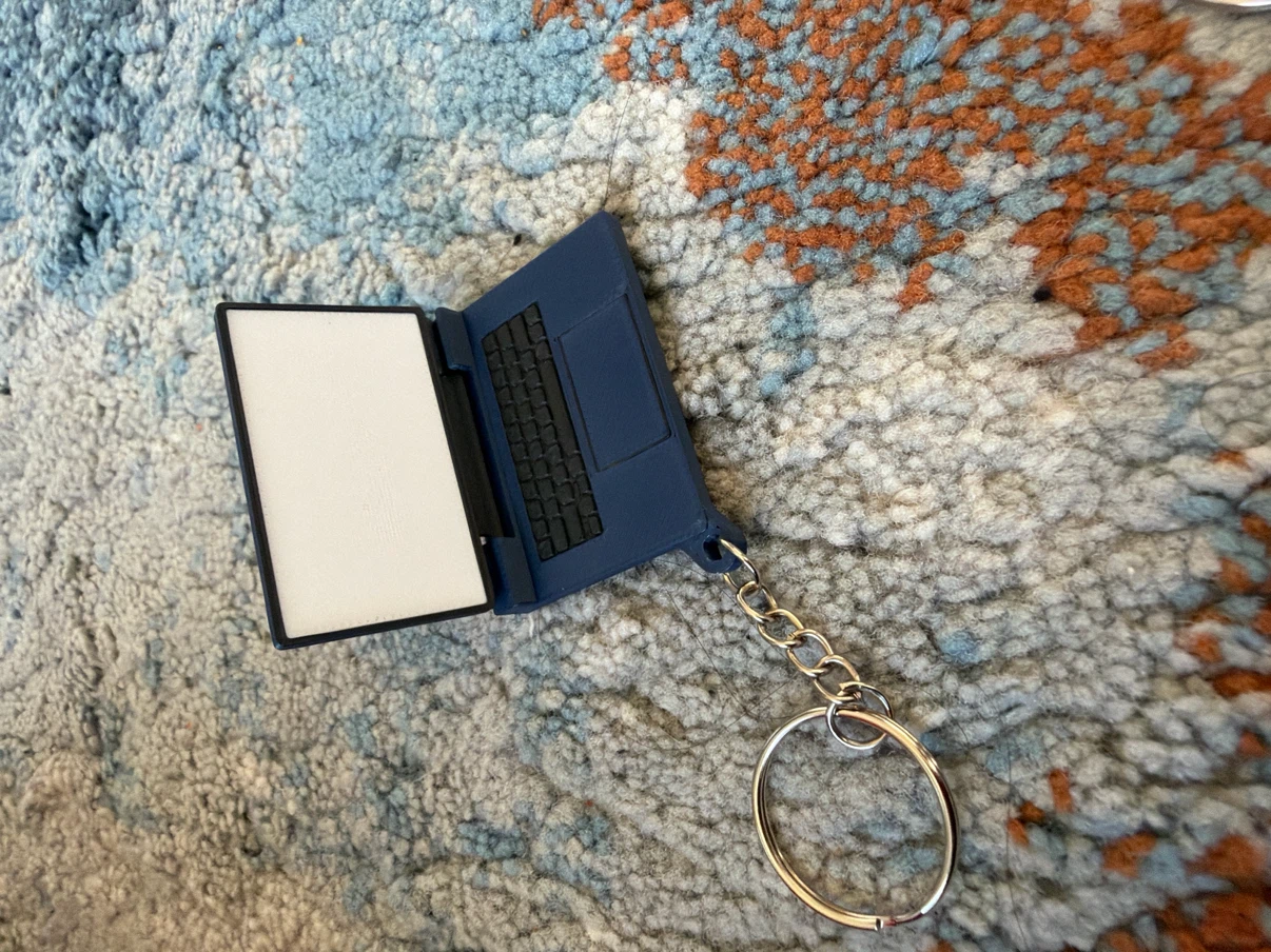 Apple laptop keychain