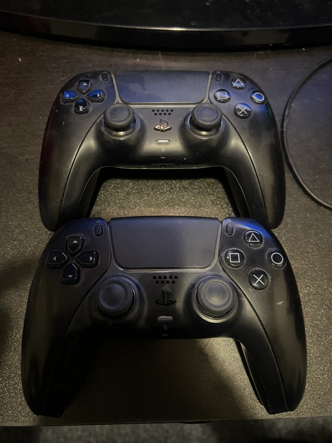 Two Black Sony PlayStation 5 DualSense Controllers