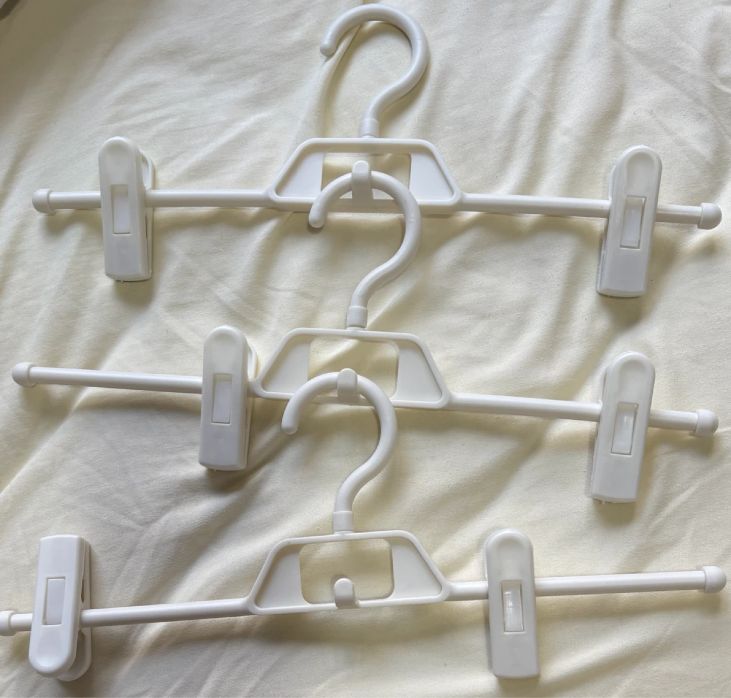 3 White Plastic Pant Hangers