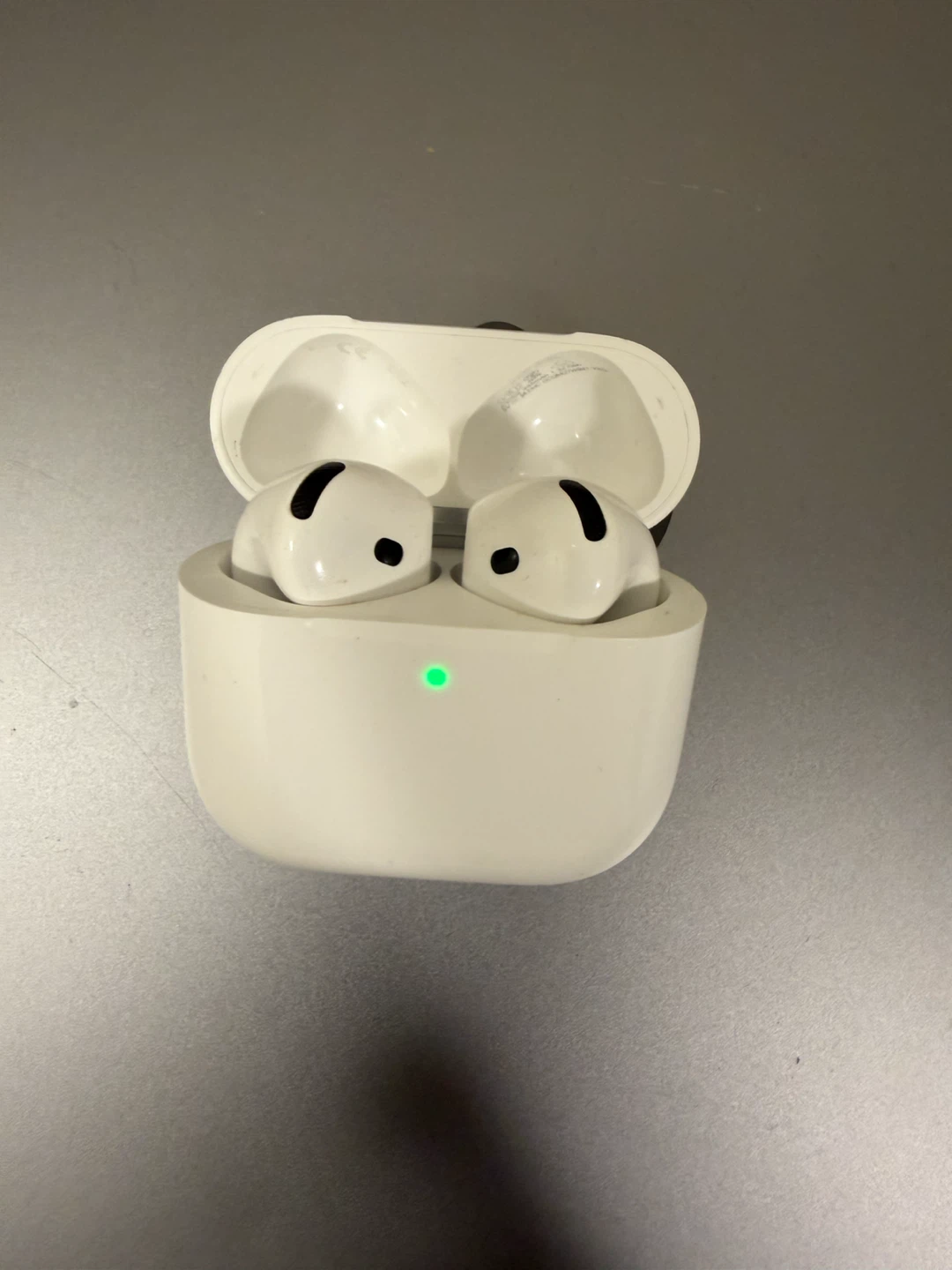 Apple AirPods 4 - photo 2