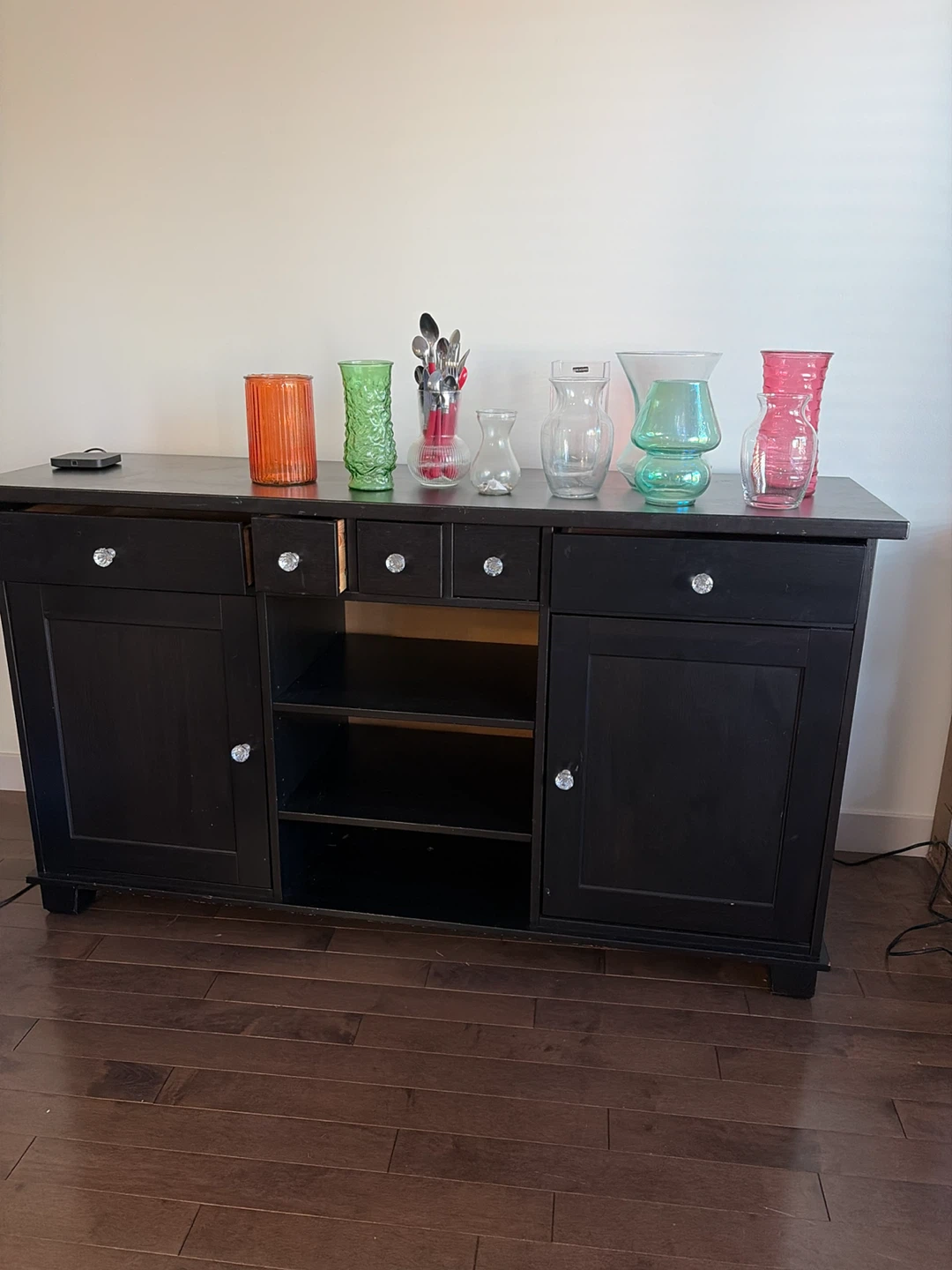 Black sideboard with crystal-style knobs