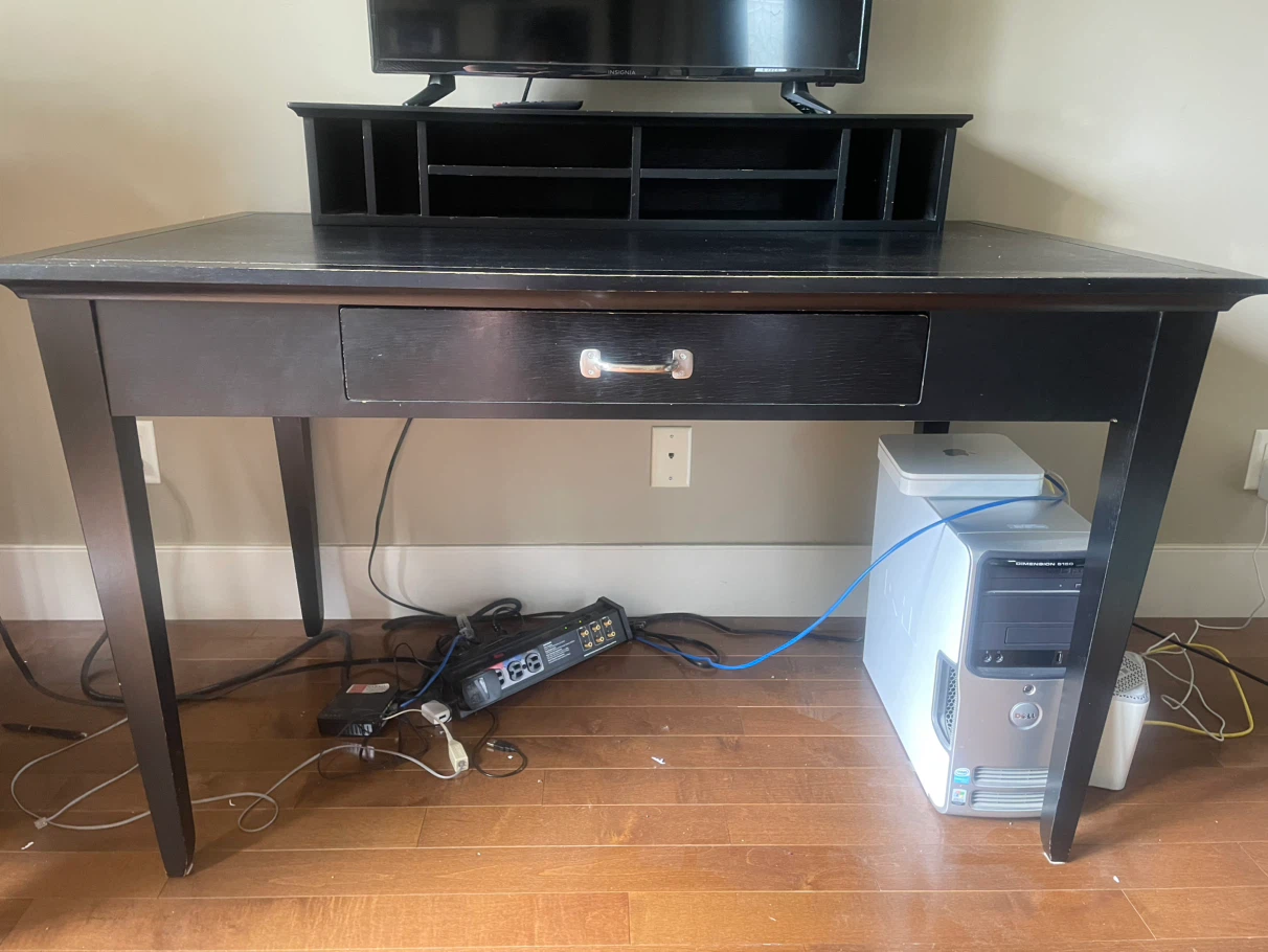 Black wooden desk with single drawer