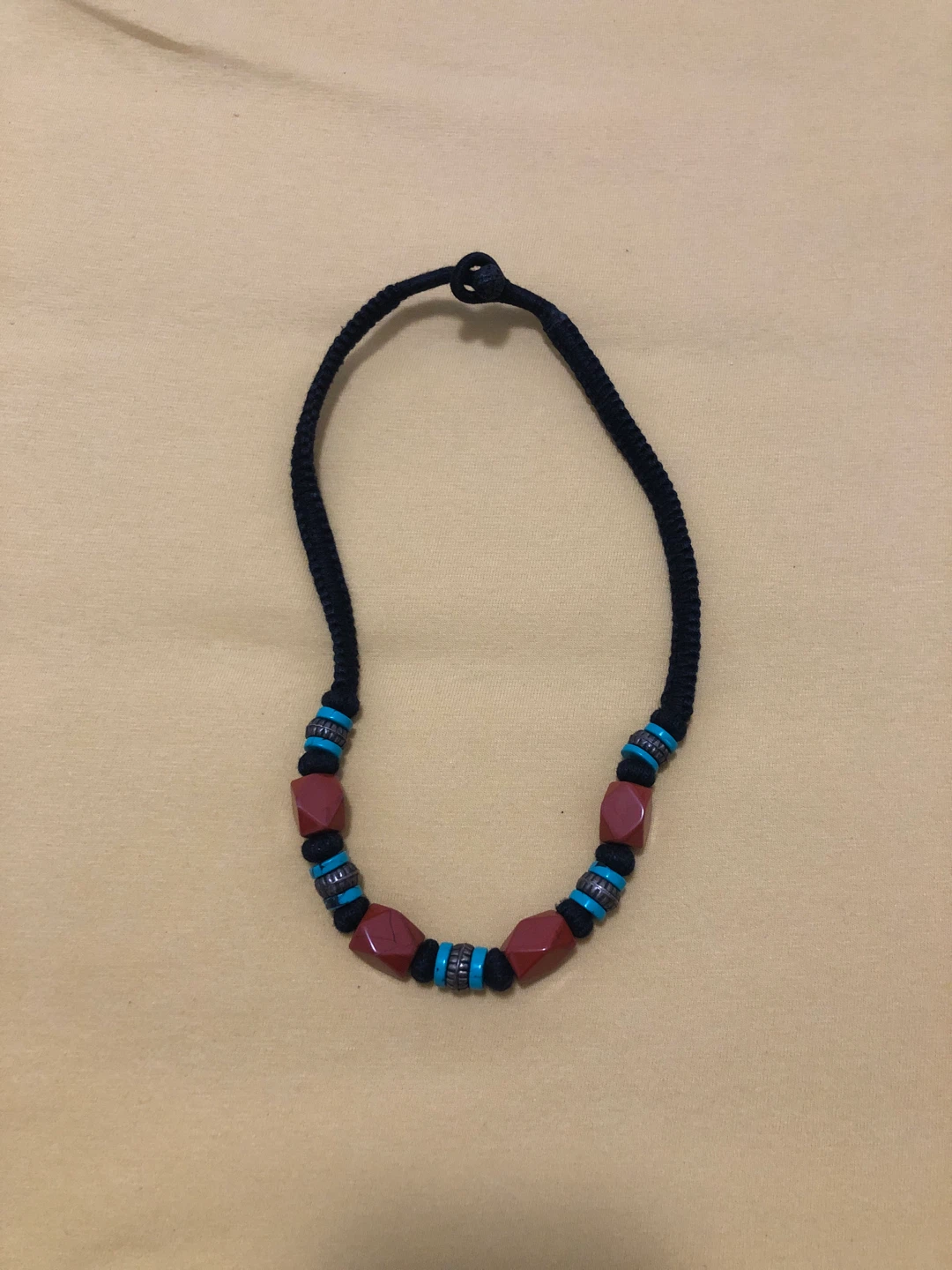 Beaded necklace with cord