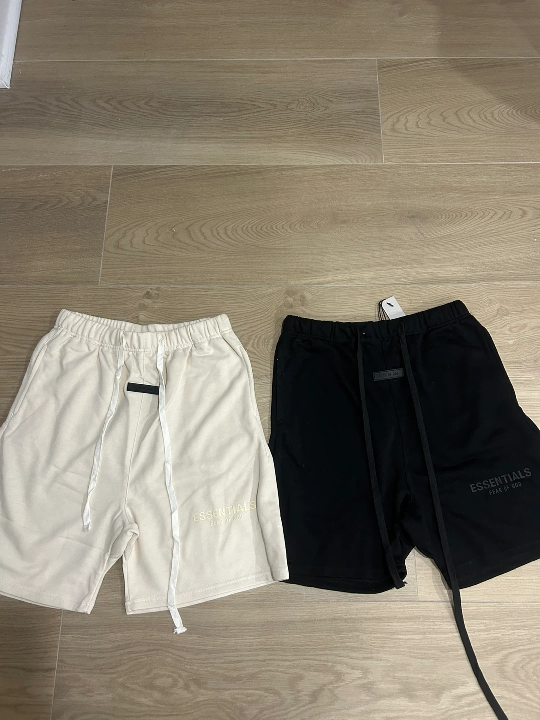 Two pairs of Essentials Fear of God shorts
