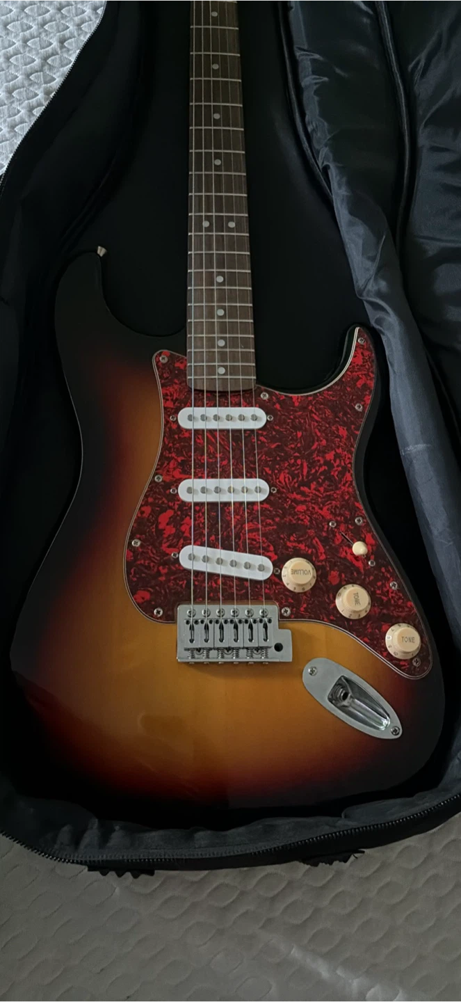 Squier Stratocaster Guitar and Fender Frontman 15R Amp