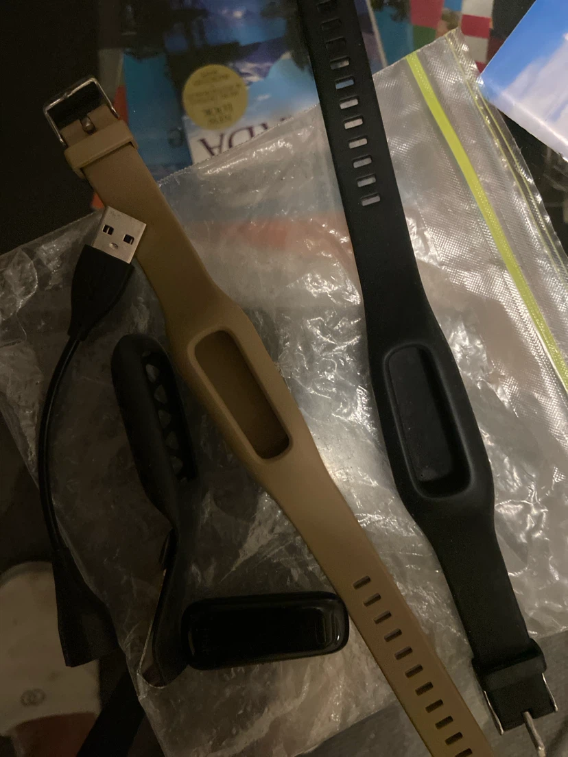 Fitbit fitness tracker with extra bands