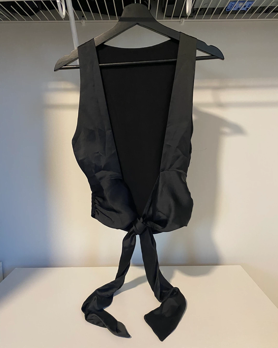 Black tie-back satin blouse