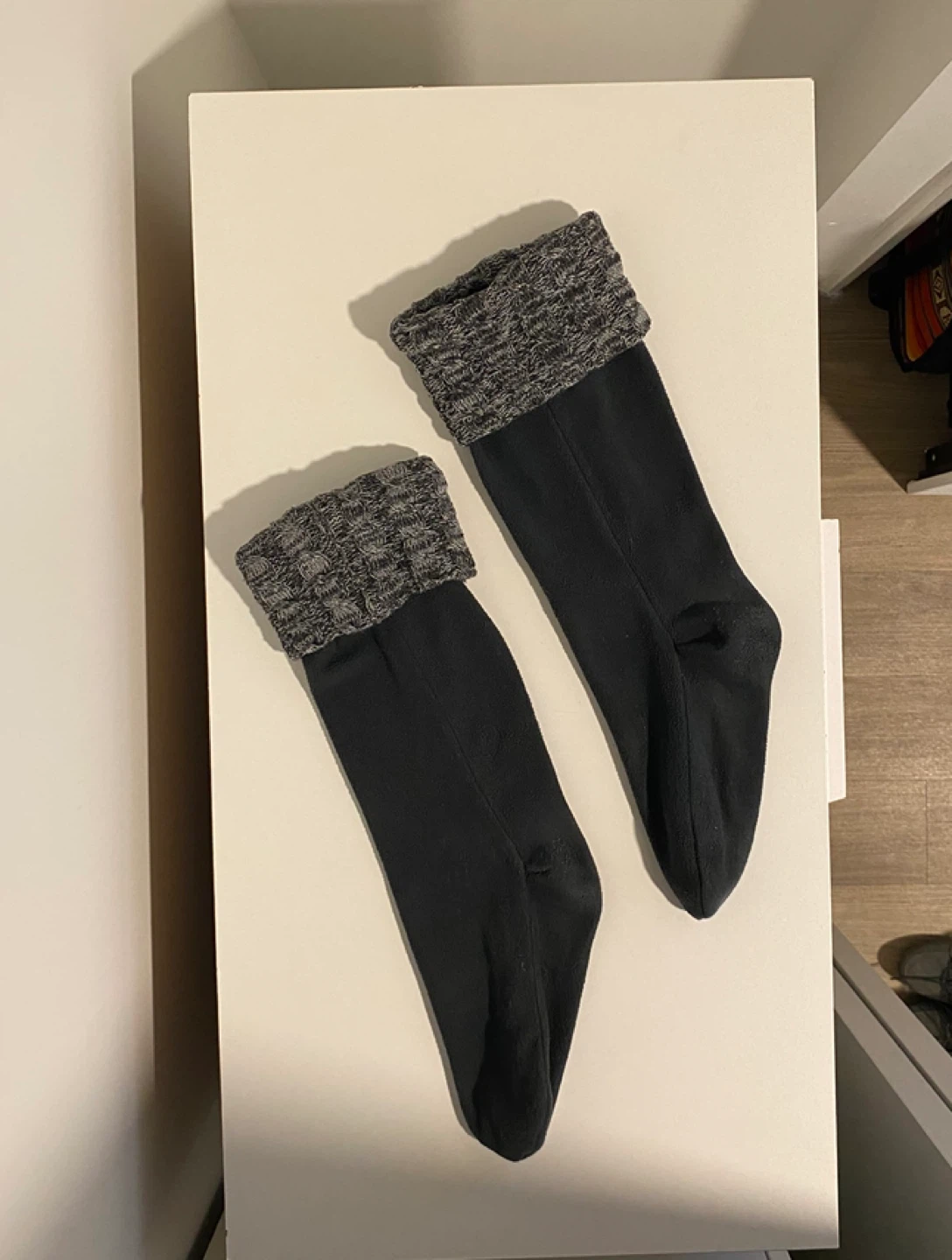 Black fleece boot liners with grey knit cuffs