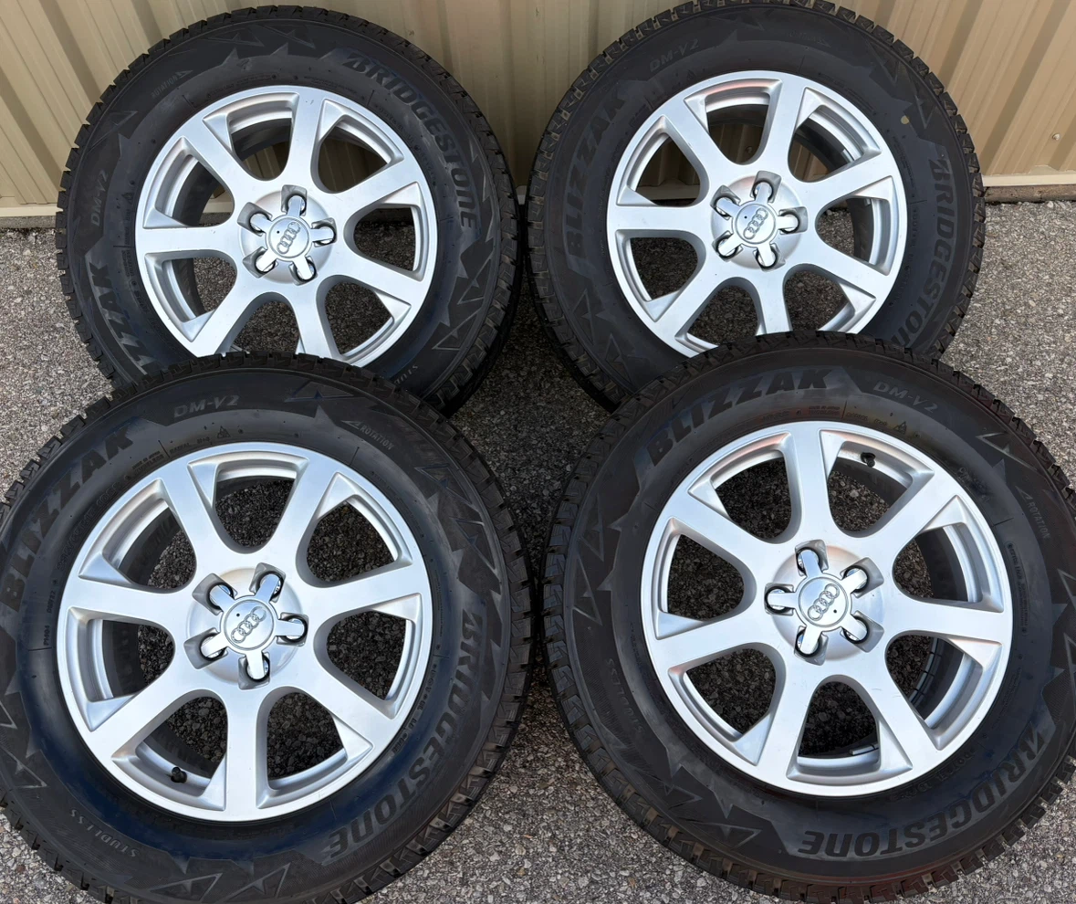 4 x 235/65/17 BRIDGESTONE WINTER TIRES AND AUDI RIMS  $1450