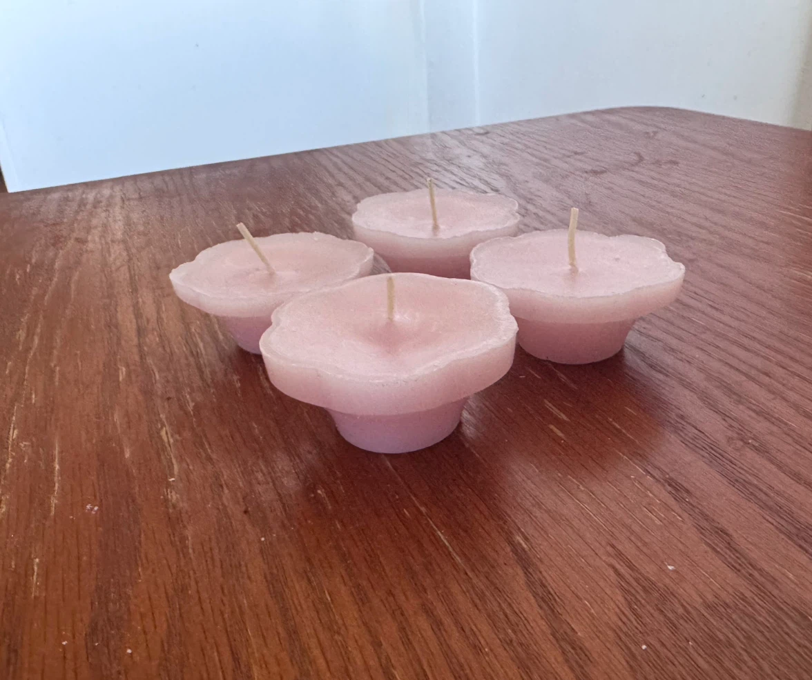 Four Light Pink Flower-Shaped Candles
