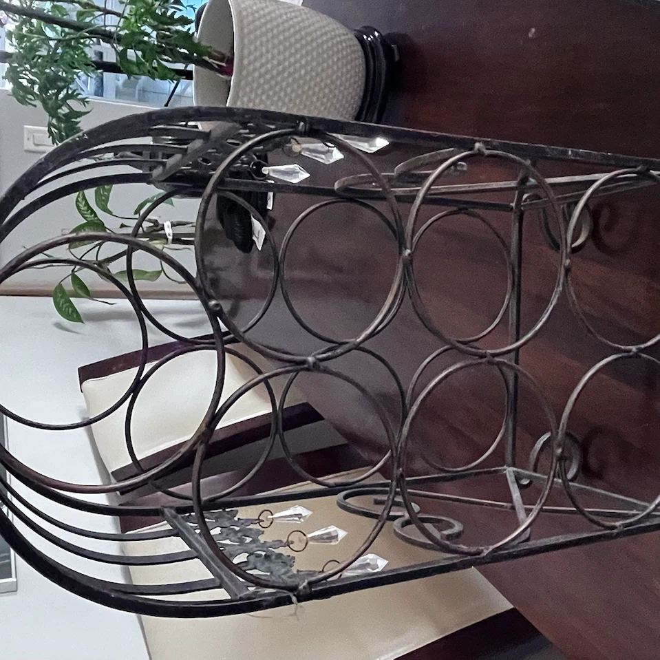 Metal wine rack with ornate details - photo 2