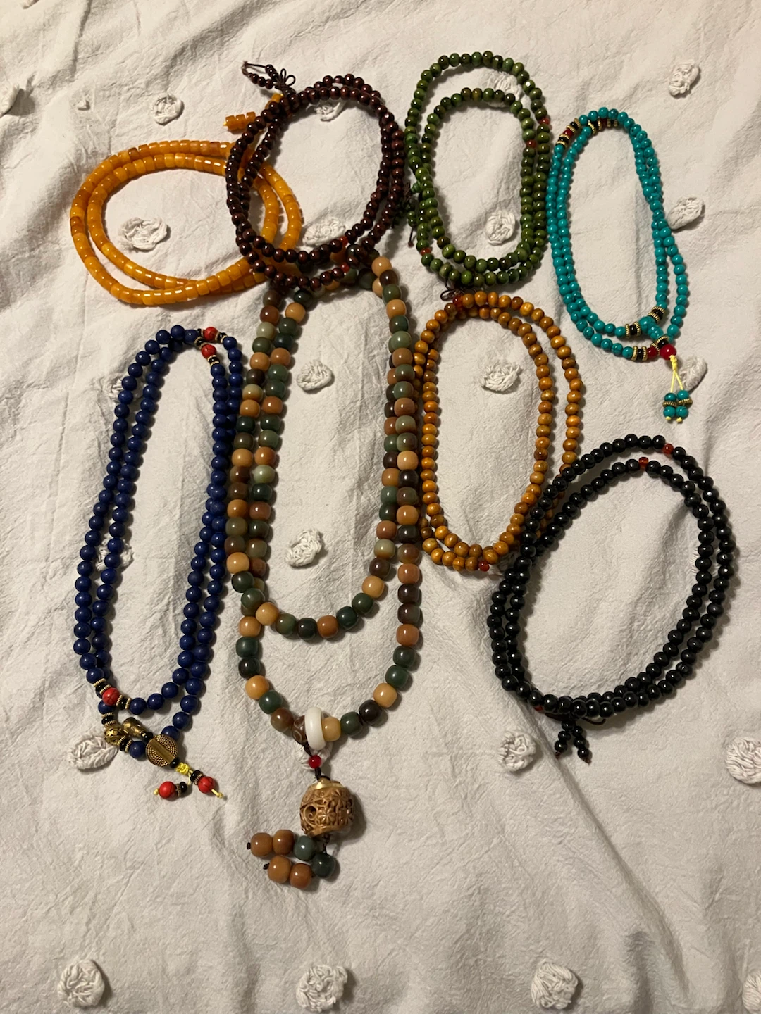 Set of 8 assorted wooden and stone bead necklaces