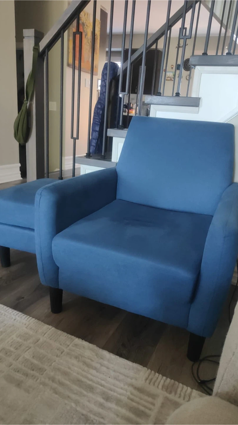 Blue accent chair with matching ottoman