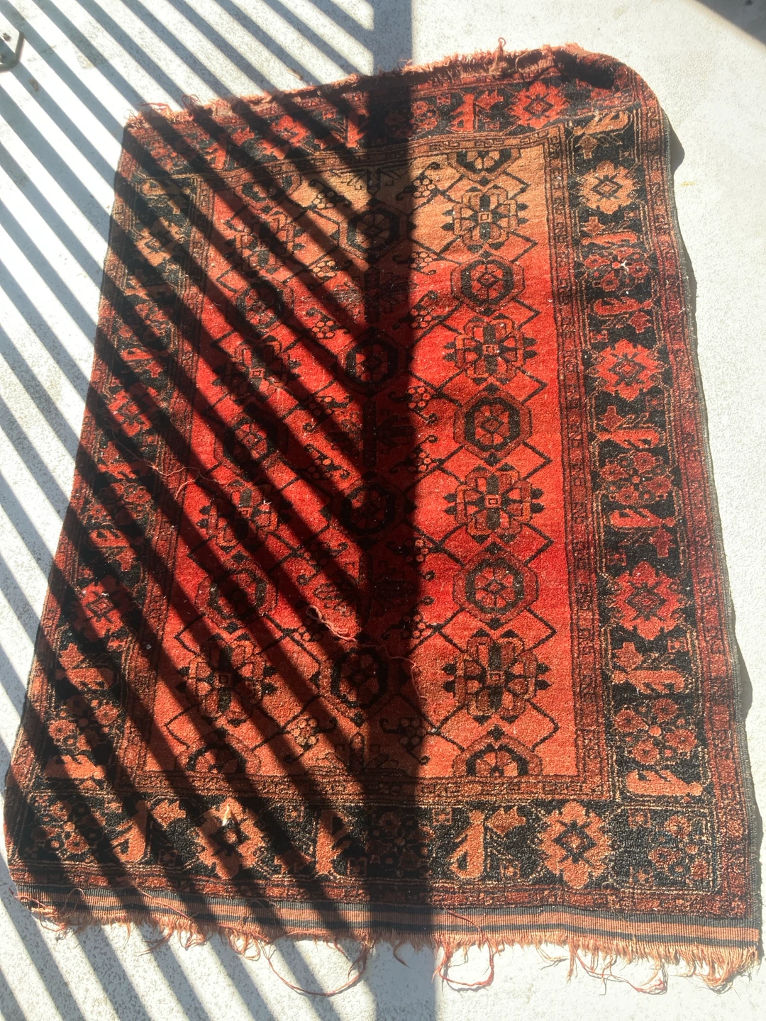 Vintage Hand-Woven Red and Black Patterned Area Rug