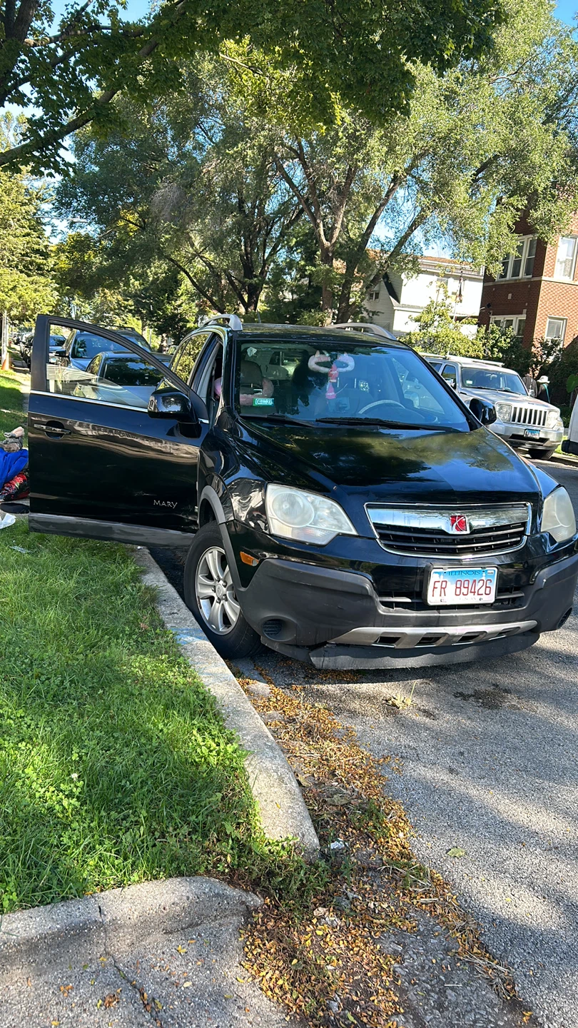 Black Saturn Vue SUV