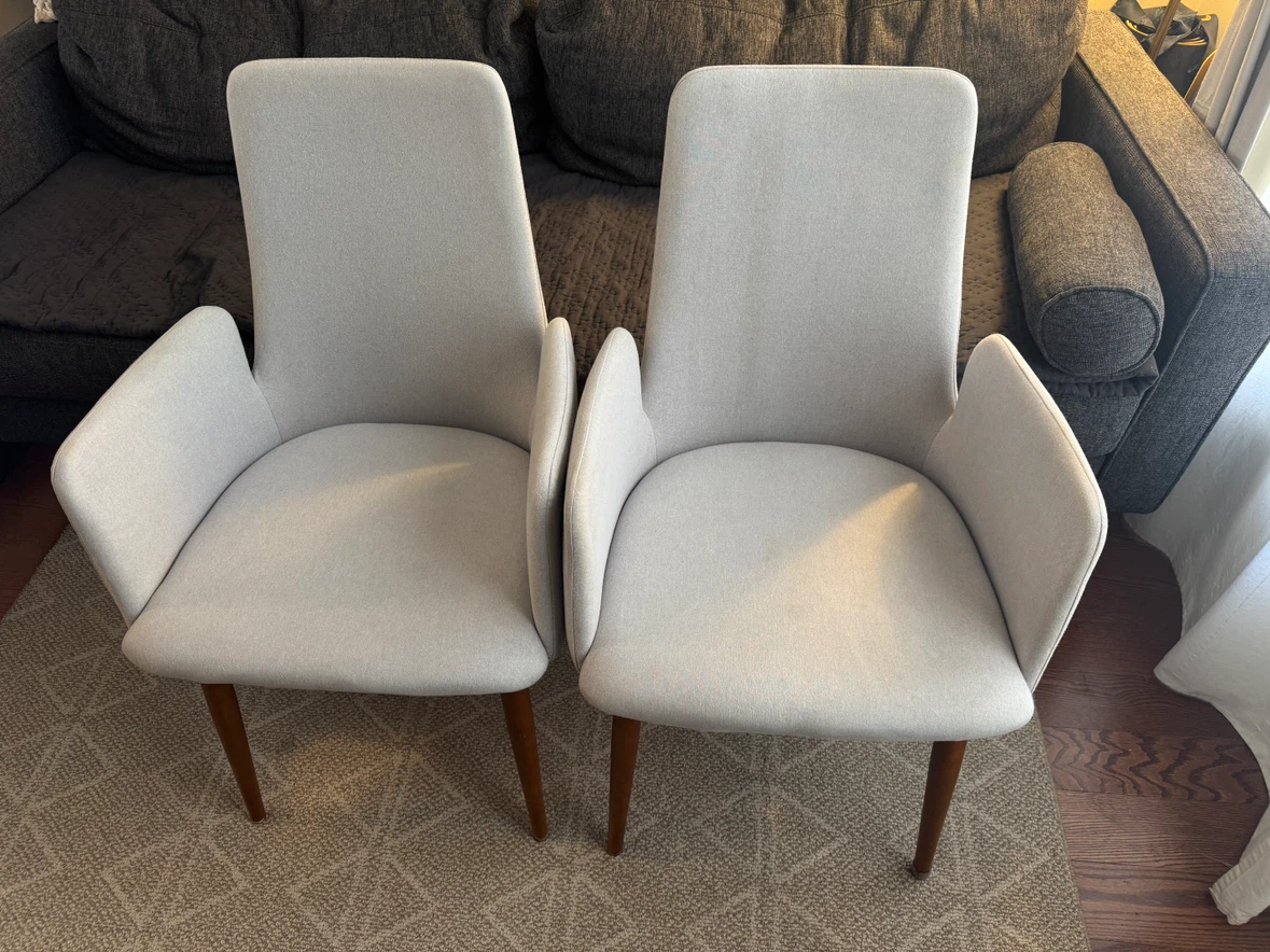 Two Structure light grey upholstered armchairs