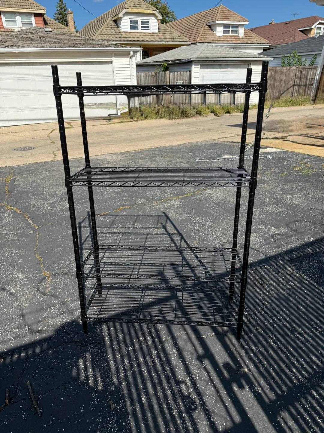Black Wire Storage with 4 Shelving Unit. $40.00 or best offer.