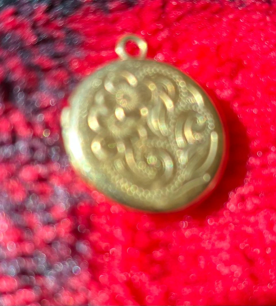 Gold-tone engraved circular locket