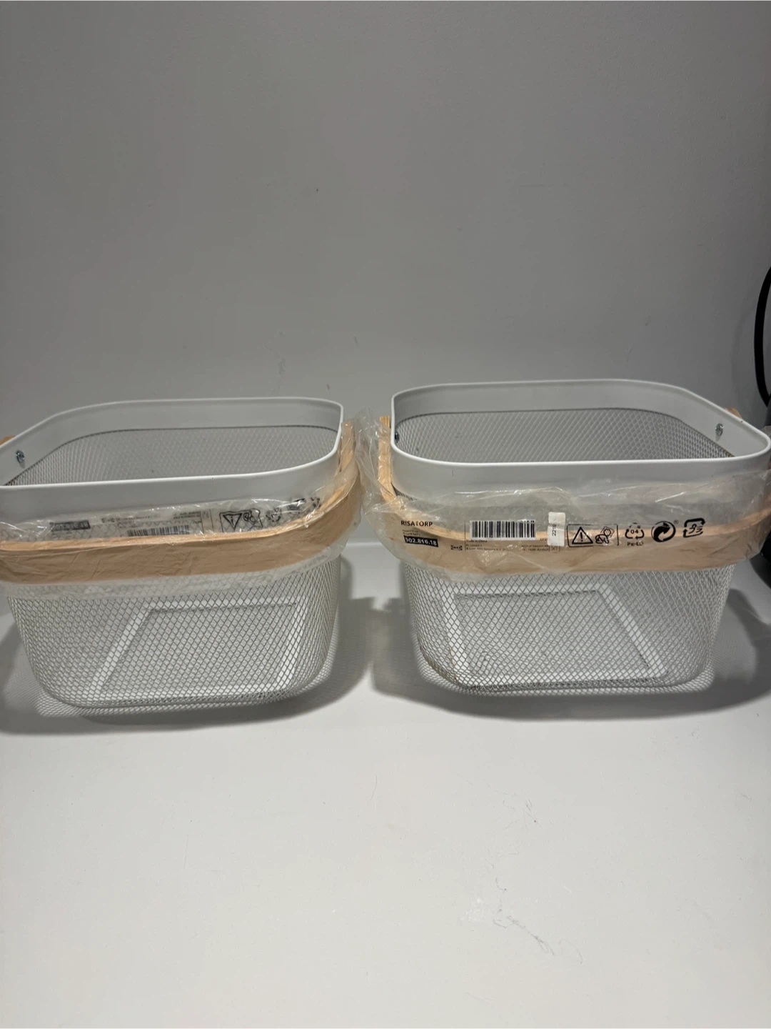 Two IKEA RISATORP Wire Baskets