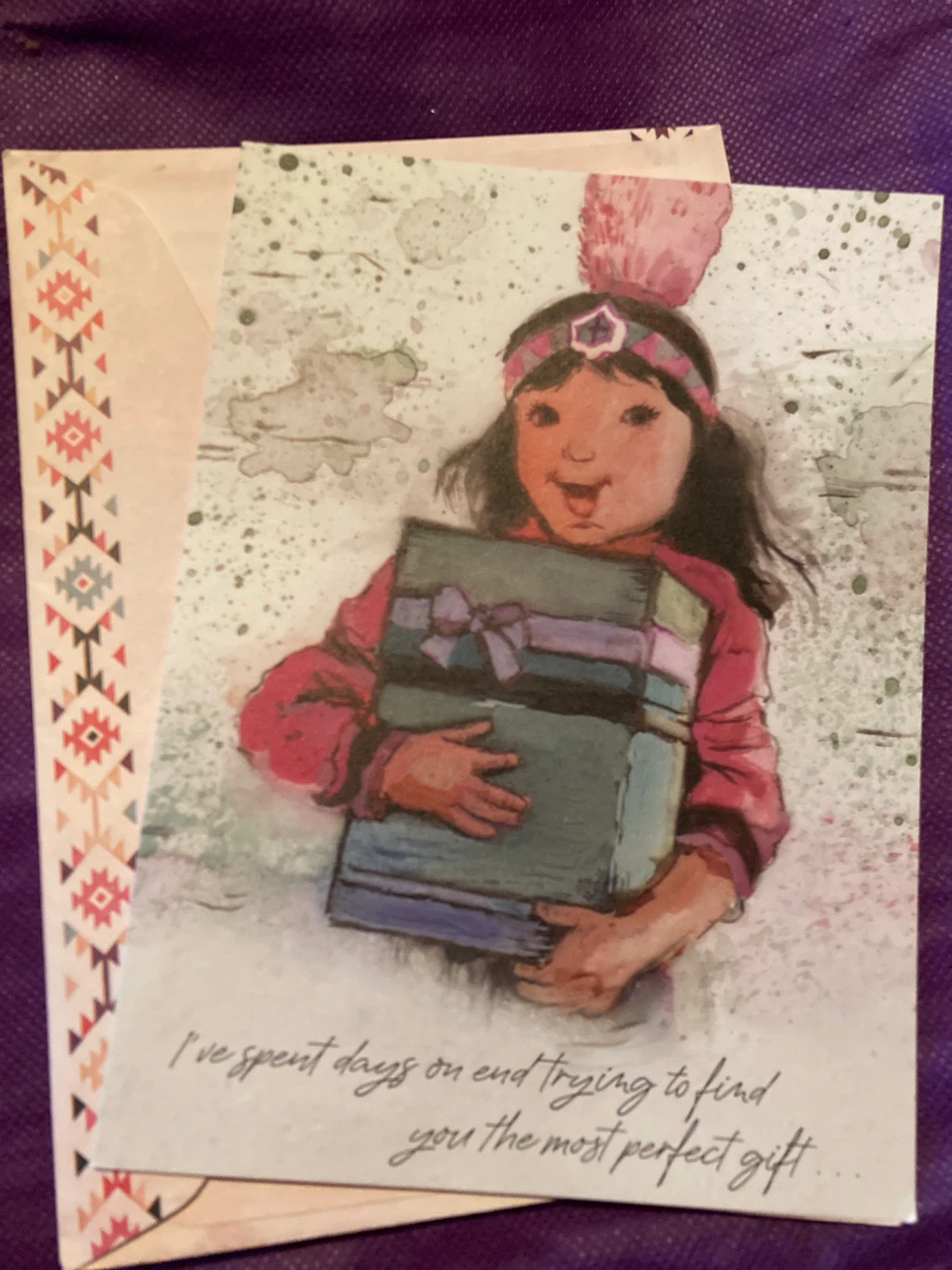 child holding gifts card