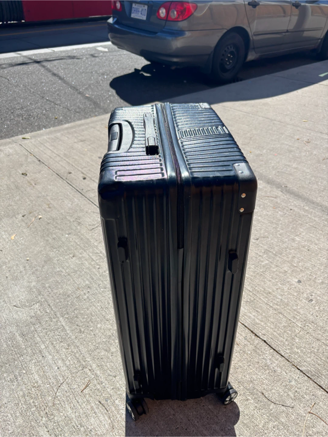Large check in Calpak black hard-shell suitcase - photo 5