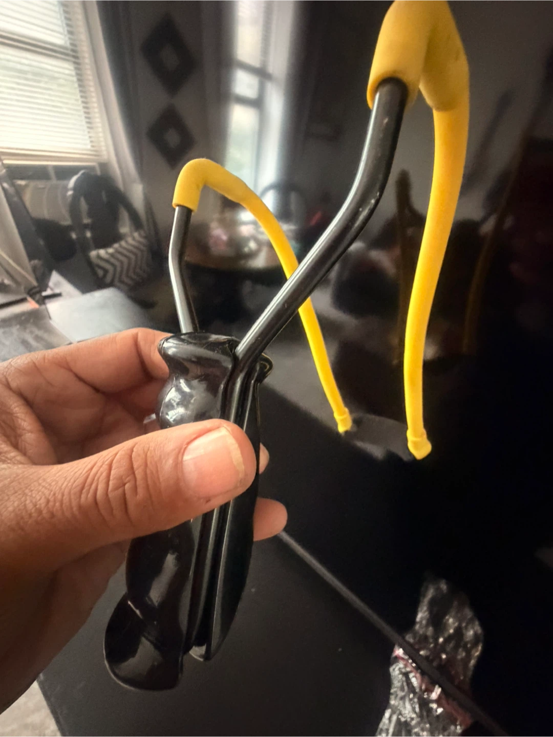 Slingshot with Black Grip and Yellow Bands
