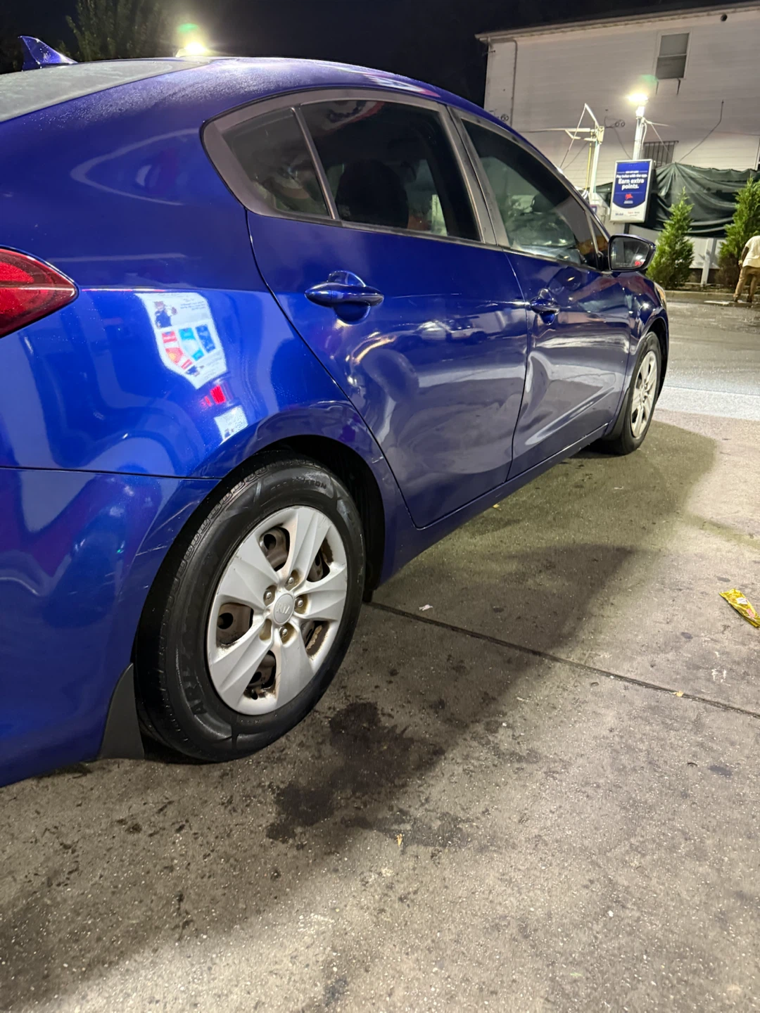 Blue Kia Sedan - photo 3