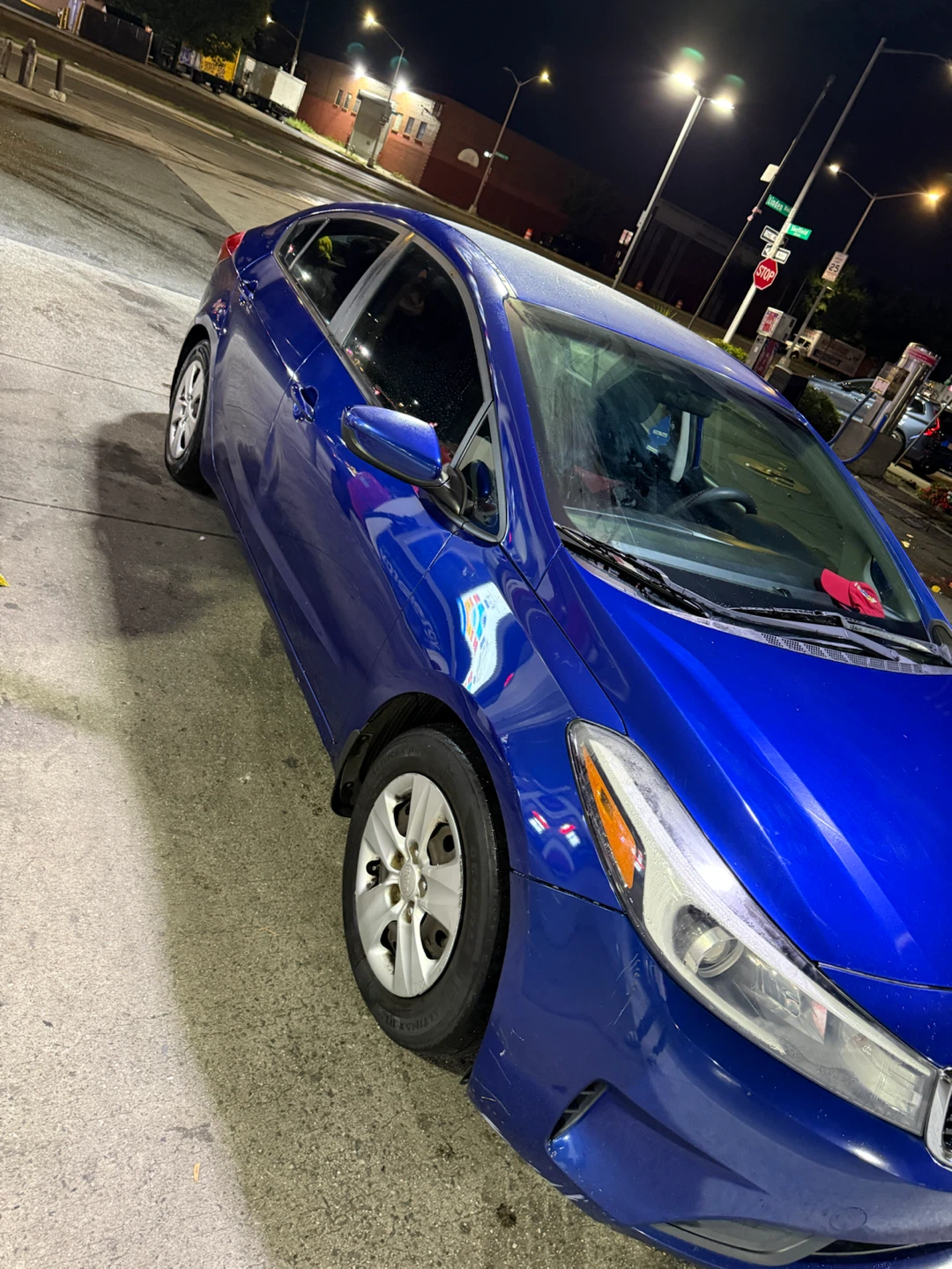 Blue Kia Sedan - photo 4