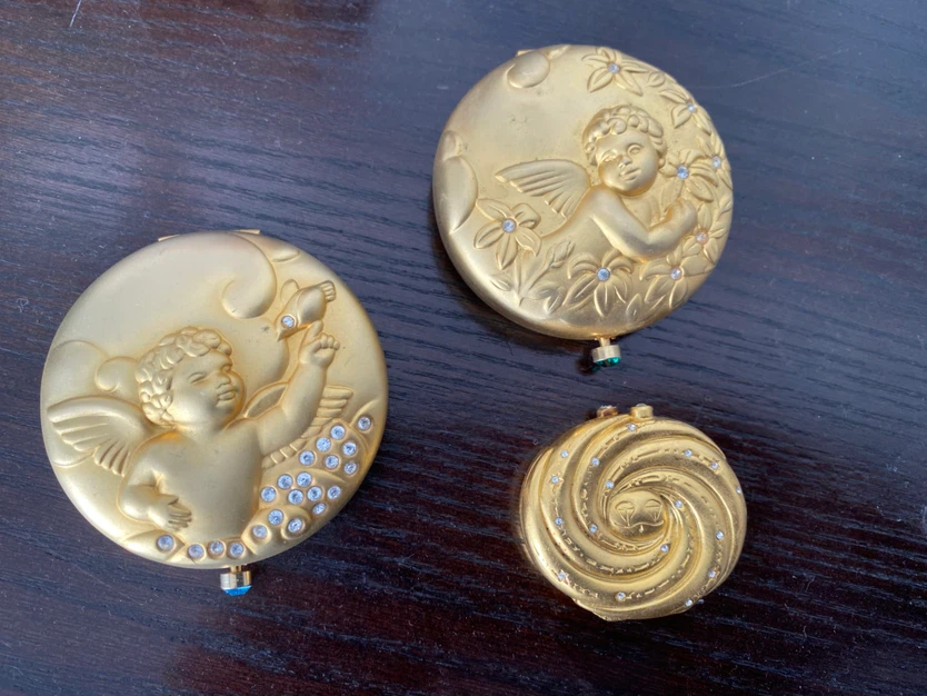3 Estee Lauder Collectible Compacts take all for 20.00