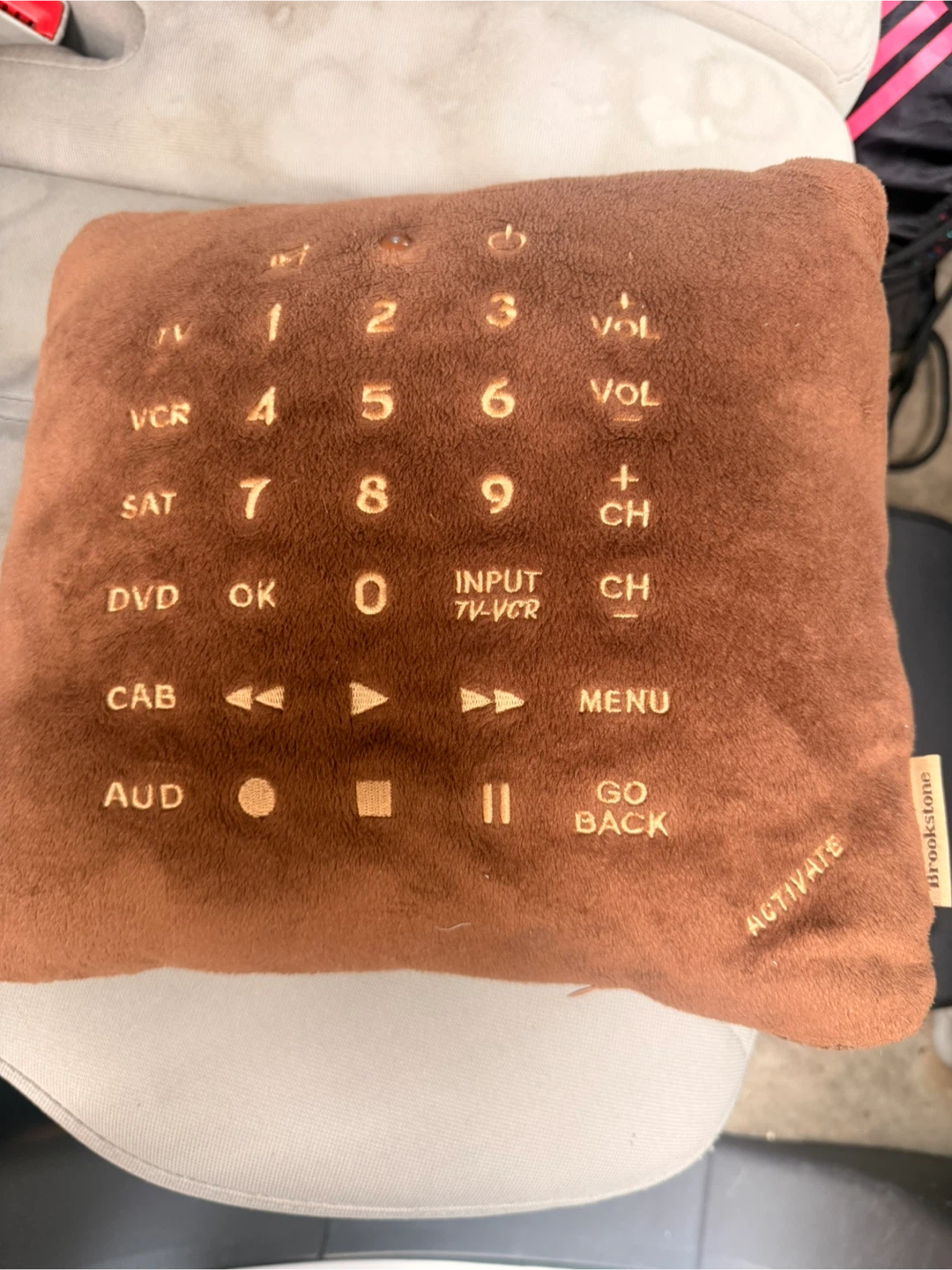 Brookstone Remote Control Plush Pillow