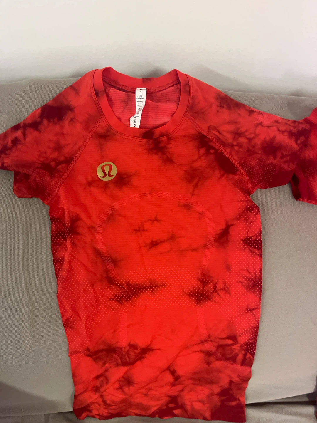Two Lululemon Red Tie-Dye Short Sleeve Shirts - Size 2