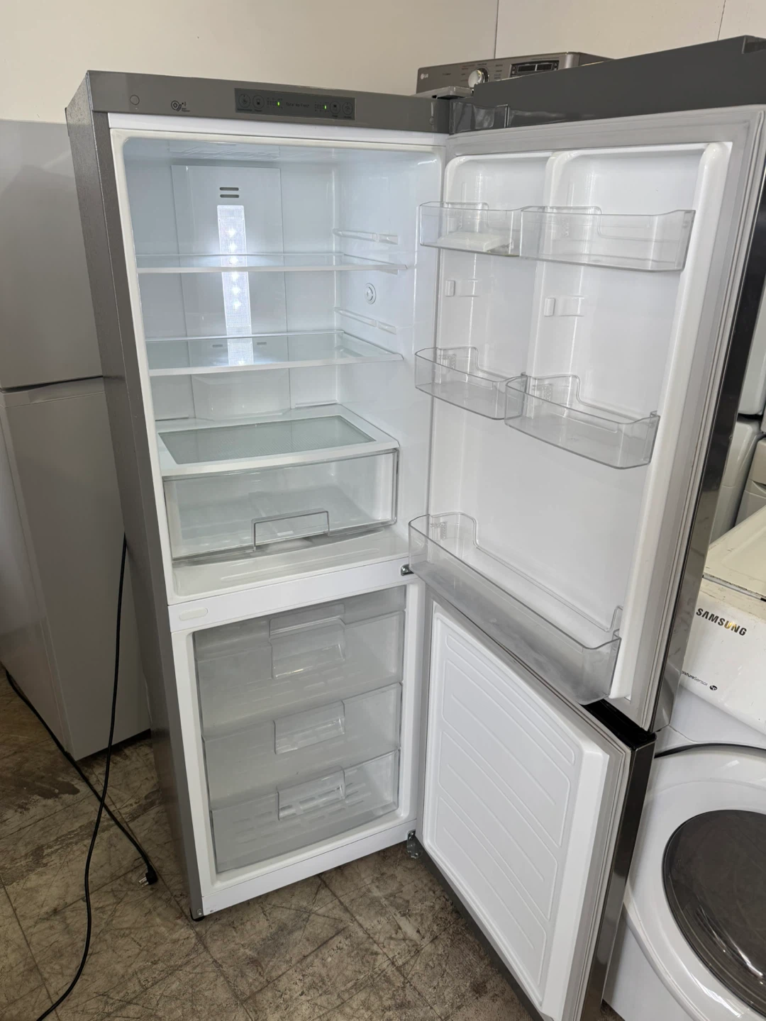 LG 24” Bottom Freezer Refrigerator - photo 2
